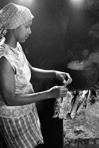 Woman cooking a turtle, San Basilio de Palenque, 1977