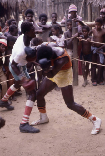 Boxers fighting inside boxing ring, San Basilio de Palenque, 1976