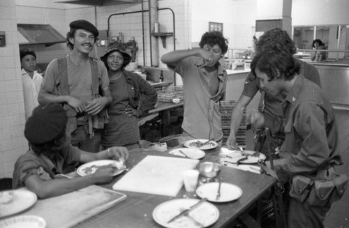 Sandinistas eat at a hotel, Managua, 1979