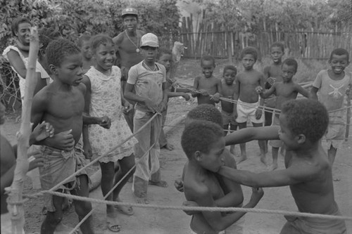 Children boxing inside ring, San Basilio del Palenque, ca. 1978