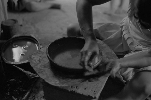 A woman making pottery, La Chamba, Colombia, 1975