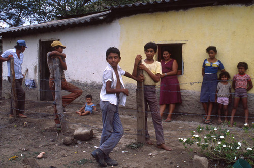 Group of people near a home, Honduras, 1983