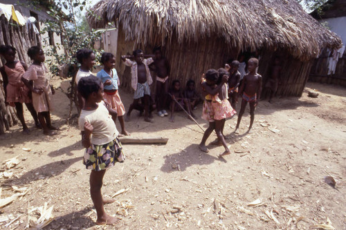 Girls boxing outdoors, San Basilio de Palenque, 1976