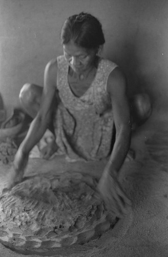 Woman making pottery, La Chamba, Colombia, 1975