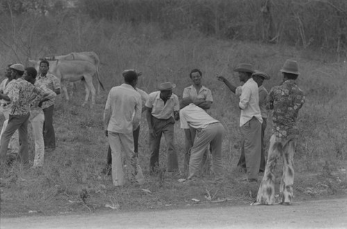 Men in cemetery, San Basilio de Palenque, Colombia, 1977