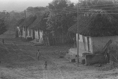 Children walking in the street, San Basilio de Palenque, 1976