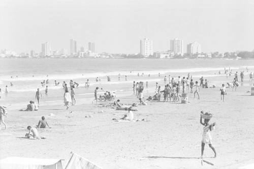 Woman selling fruit at the beach, Cartagena, ca. 1978