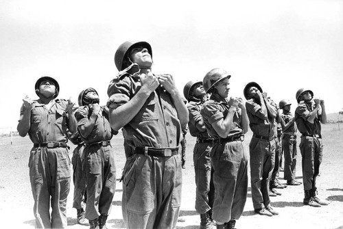 Salvadoran soldiers conduct parachuting exercises, Ilopango, 1983