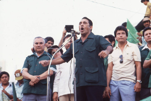 José Napoleón Duarte talking at the microphone, San Salvador, El Salvador, 1982