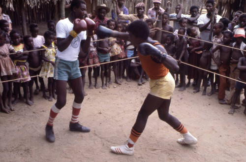 Boxers fighting inside boxing ring, San Basilio de Palenque, 1976