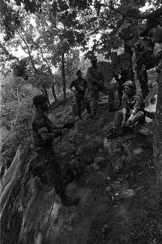 Claflin demonstrates rappelling, Liberal, 1982