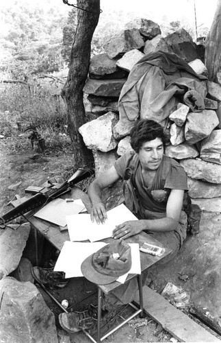 A Salvadoran army soldier keeps guard at an outpost, Perquín, 1983