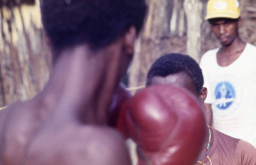 Men in boxing ring, San Basilio de Palenque, 1976