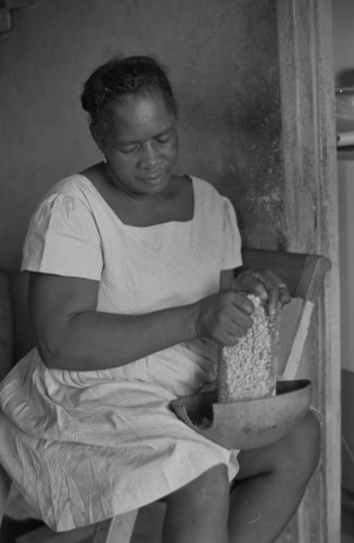 Woman using a grater, San Basilio de Palenque, 1977