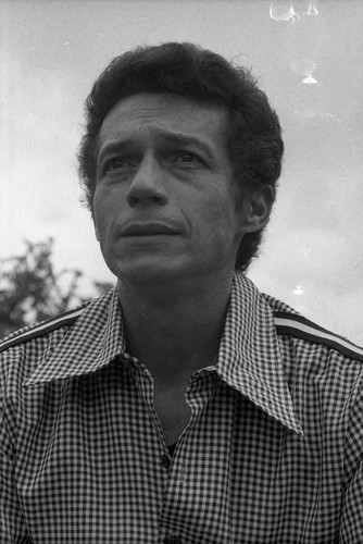 Roberto D'Aubuisson looks into the distance, San Salvador, 1982