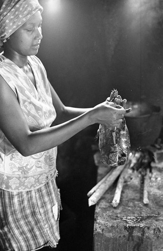 Anselma Salas cooking a turtle, San Basilio de Palenque, 1977