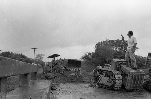 Sandinista stands on a tank, Nicaragua, 1979