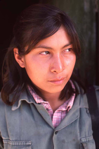 Woman guerrilla in occupied town, La Palma, 1983