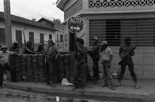 Sandinistas on street corner, Nicaragua, 1979