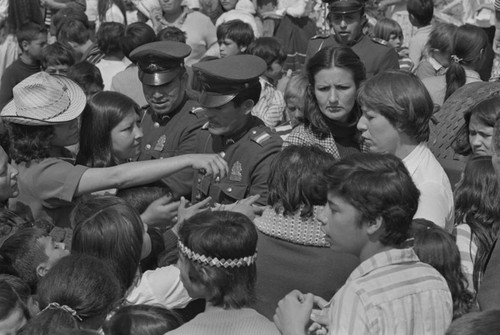 Officers amongst a crowd, Tunjuelito, Colombia, 1977