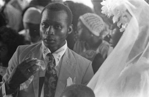 Bridegroom with tissue inside church, San Basilio de Palenque, 1975