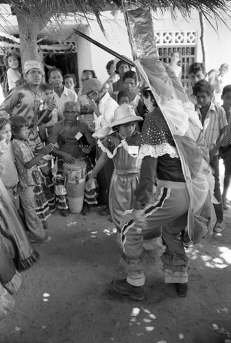 Dancing among a crowd, Barranquilla, Colombia, 1977