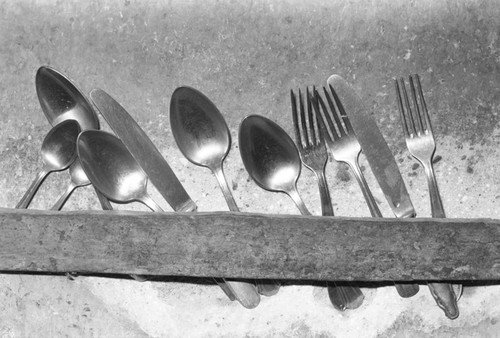 Cutlery hunging from a wall, San Basilio de Palenque, 1976