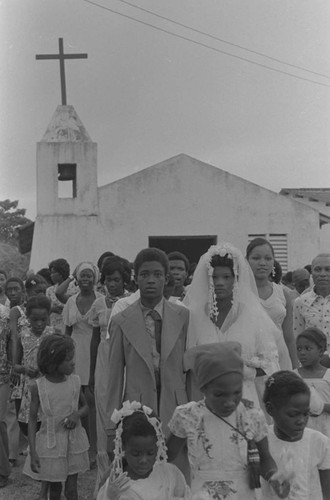 Wedding couple in front of a church, San Basilio de Palenque, 1976