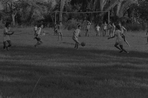 Youth playing soccer, La Chamba, Colombia, 1975