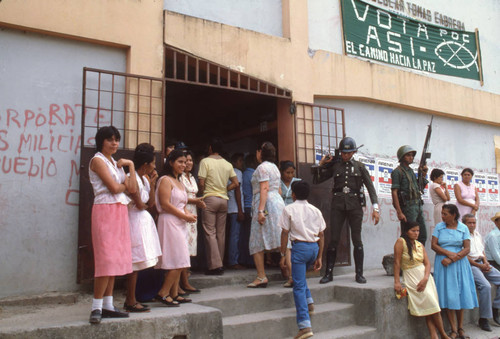 Soldiers standing at a polling site, San Salvador, El Salvador, 1982