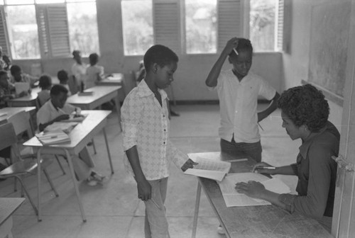 Teacher working with students, San Basilio del Palenque, ca. 1978