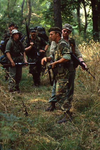 Survival school students participate in an obstacle course, Liberal, 1982