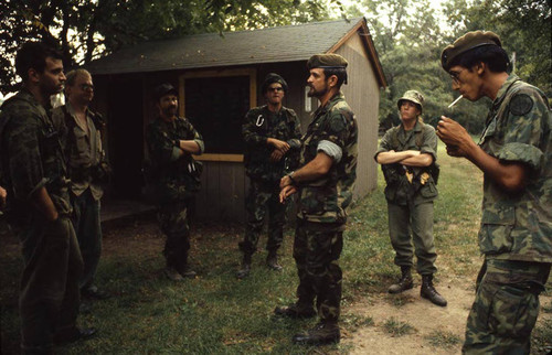 Survival school students await instructions, Liberal, 1982