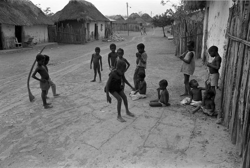 Children playing hopscotch on the street, San Basilio de Palenque, 1977