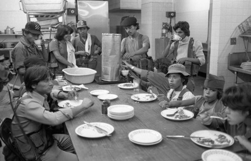 Sandinistas eat at a hotel, Managua, 1979