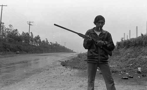 Sandinista in the rain, Nicaragua, 1979