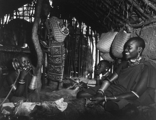 Villager wearing headphones, Tanzania, 1979