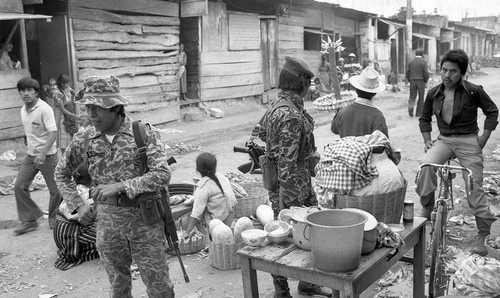 Army patrol in town, Guatemala, 1982