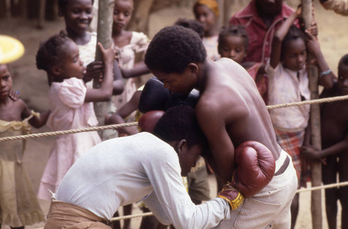 Boxers fighting inside ring, San Basilio de Palenque, 1976