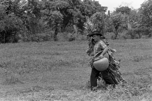 Transporting clay goods, La Chamba, Colombia, 1975