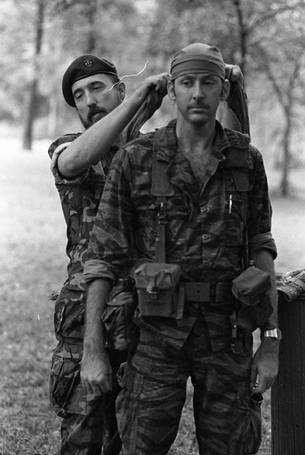 Survival school students learn first aid techniques, Liberal, 1982