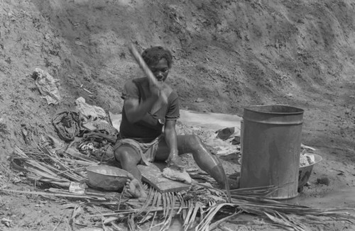 Woman washing clothes, San Basilio de Palenque, 1977