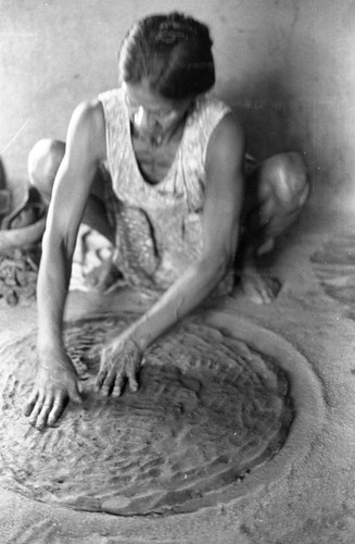 Woman making pottery, La Chamba, Colombia, 1975