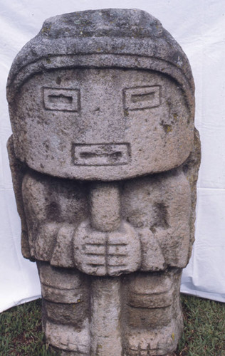 Stone statue with a mask-like face, San Agustín, Colombia, 1975