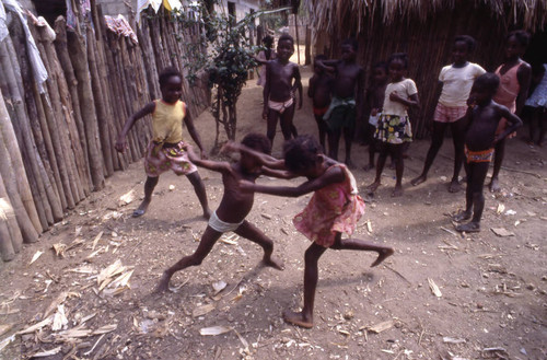 Children boxing outdoors, San Basilio de Palenque, 1976