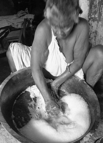 Woman washing clothes, San Basilio de Palenque, 1977