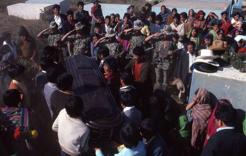 Mayan men carrying a casket at cemetery, Patzún, 1982