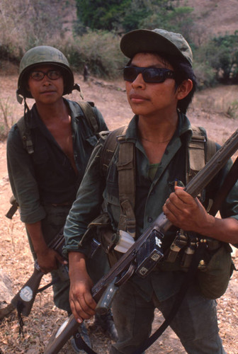 Soldiers standing on the road, San Antonio de los Ranchos, Chalatenango, El Salvador, 1981