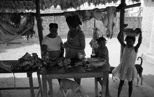 Women selling and buying meat, San Basilio de Palenque, 1976