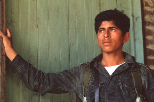 Soldier standing at military barracks near Suchitoto, Cuscatlán, El Salvador, 1981